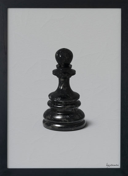 Black marble chess piece on a light gray background