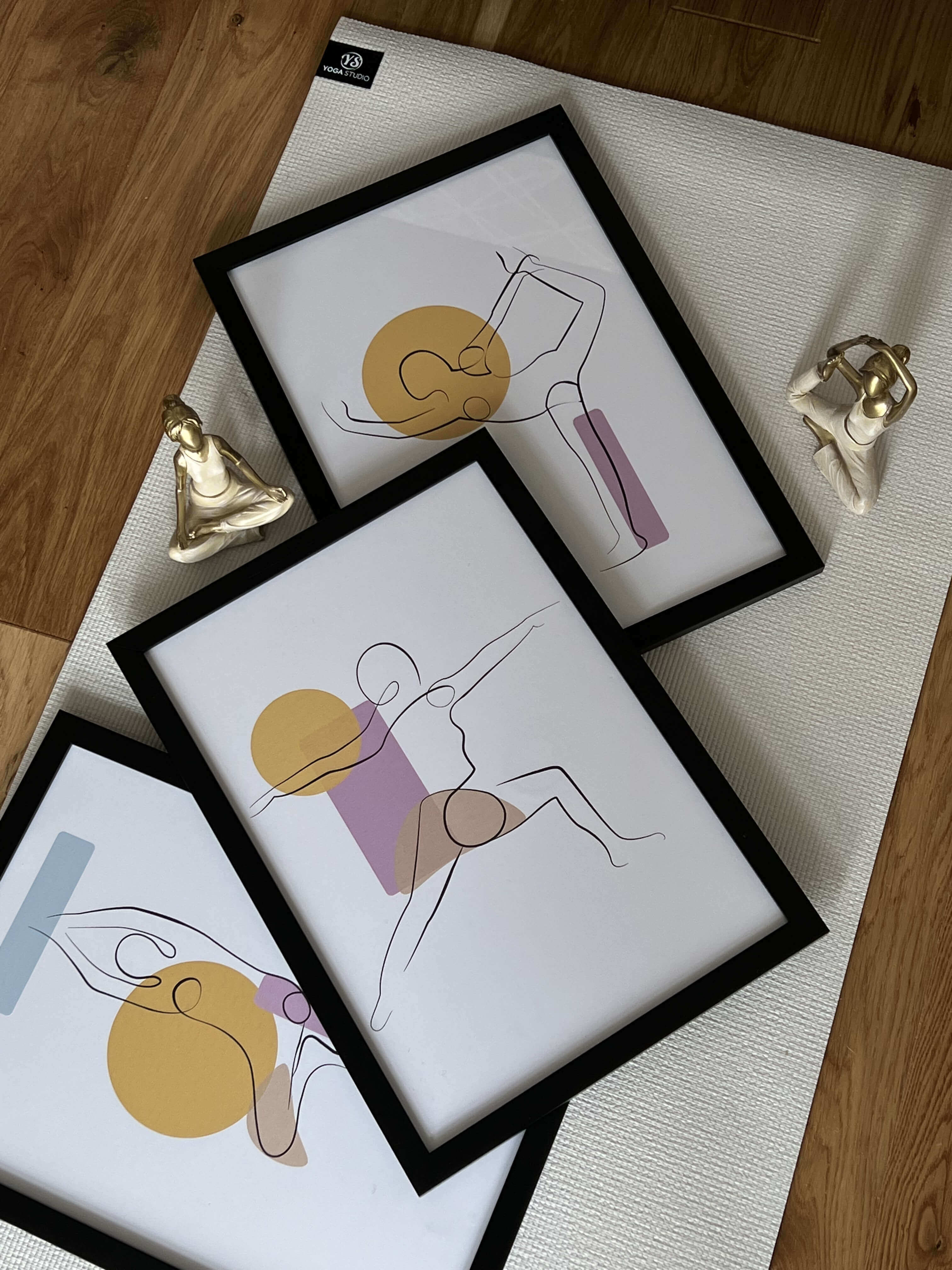 The picture shows three minimal line art prints of yoga poses and asanas using minimal and abstract art designs. The picture is an art collection for Yoga line art.
