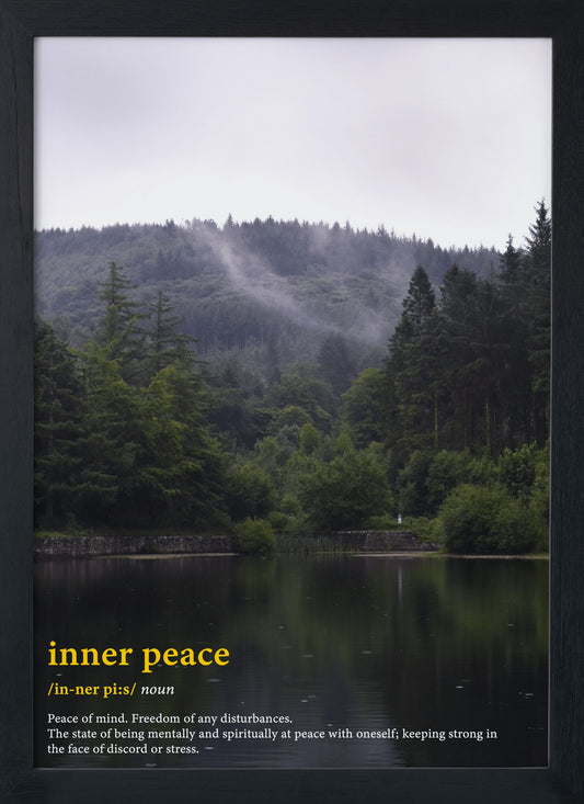 The inner peace word definition poster. Inner Peace (noun). Peace of mind. Freedom of disturbances. The state of being mentally and spirtiually at peace with oneself; keeping strong in the face of discord or stress. This photography print captures the fog lifting from the forest, trees and the lake.